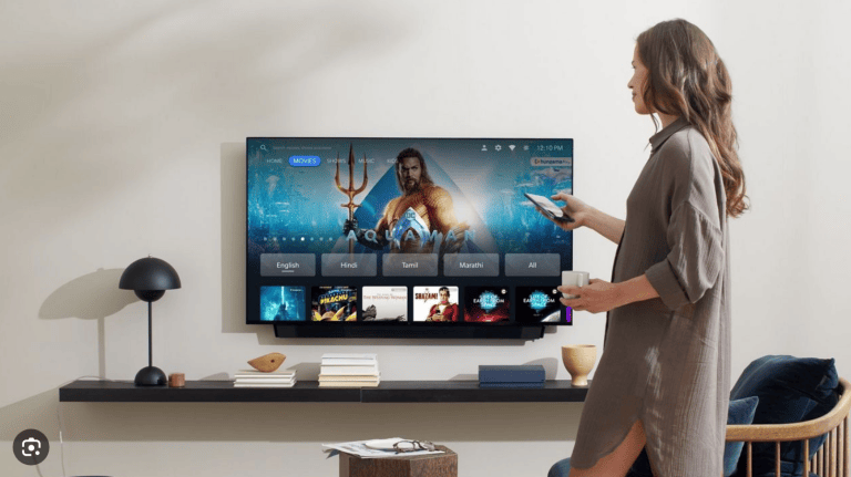 Filmstreaming-grænseflade med Aquaman-karakteren og sprogindstillinger engelsk, hindi, tamil og marathi.