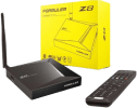 En Formuler Z8 IPTV-boks og dens fjernbetjening foran den originale gule produktæske.